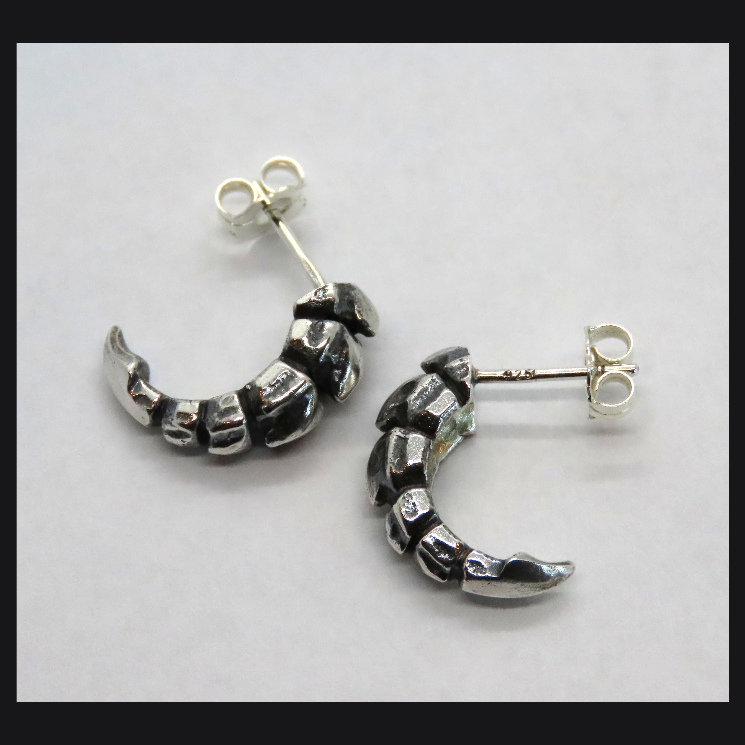 Talon Studs