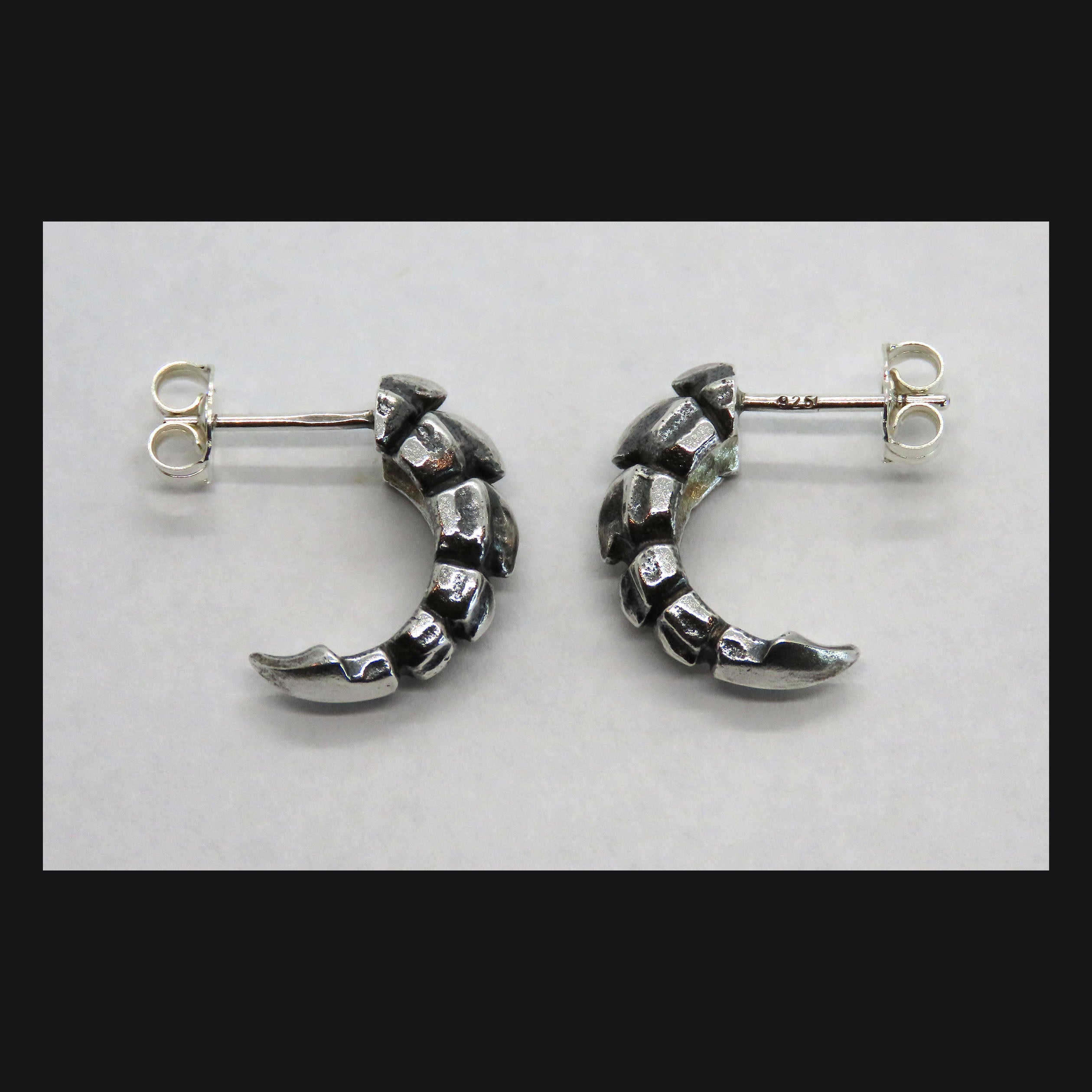 Talon Studs