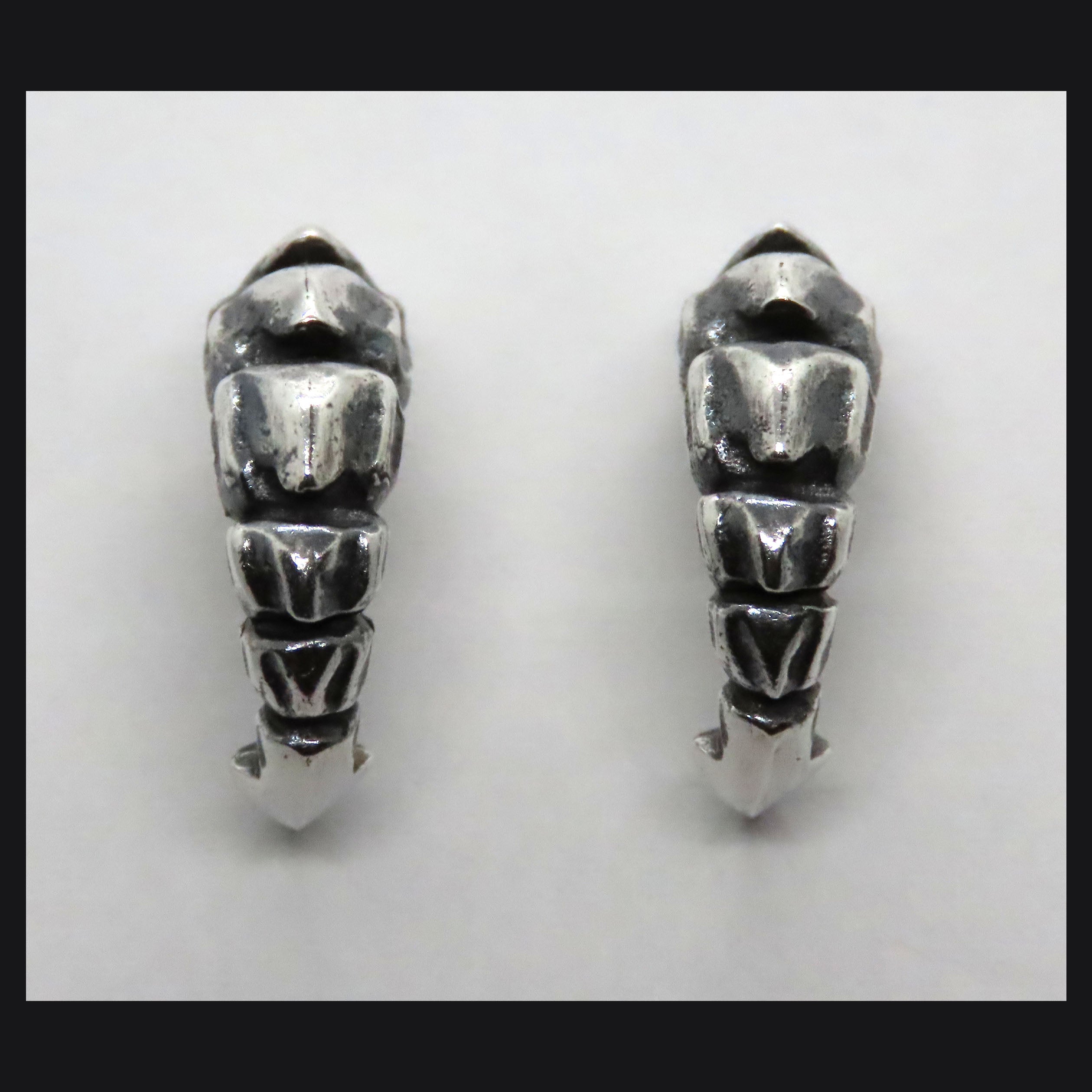 Talon Studs