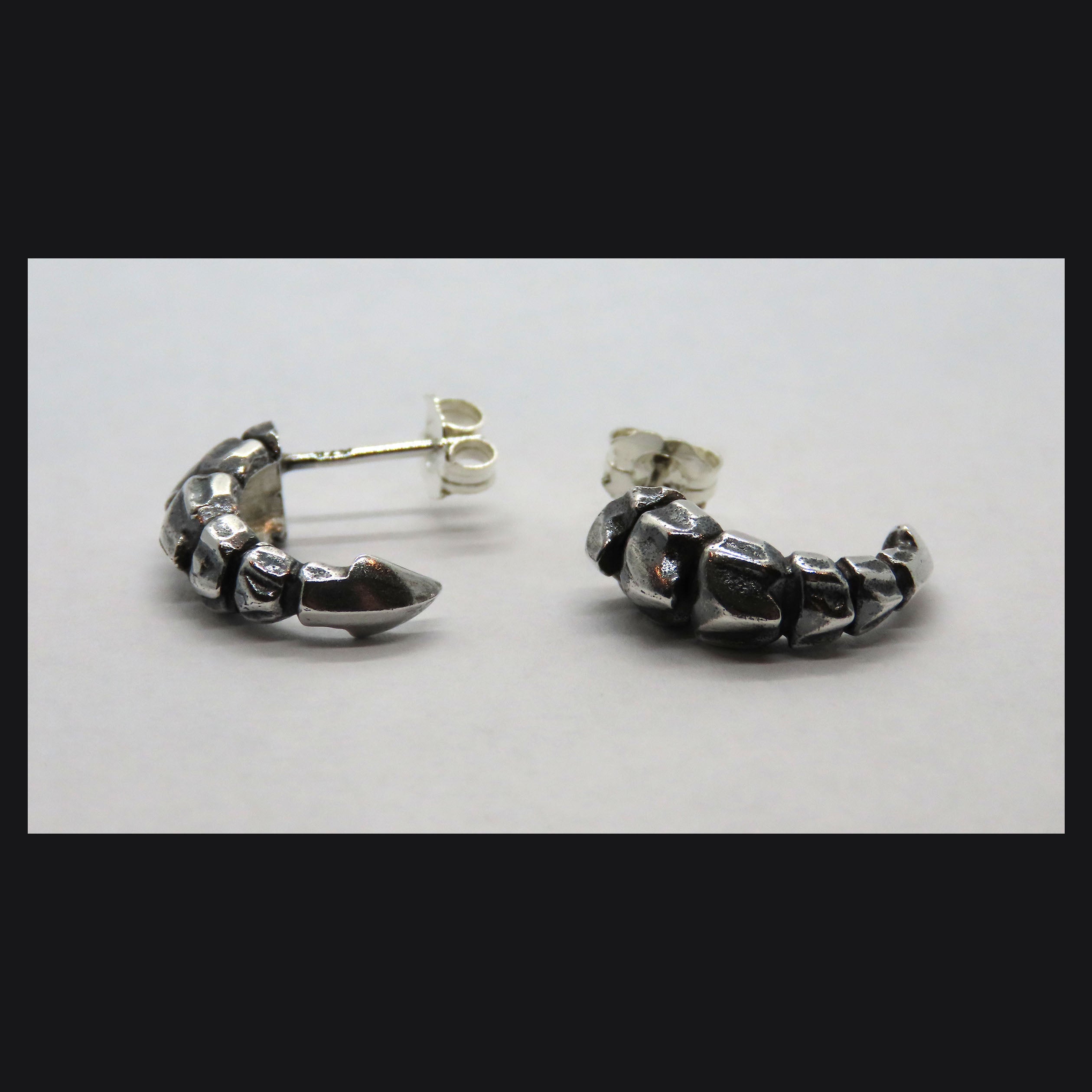 Talon Studs